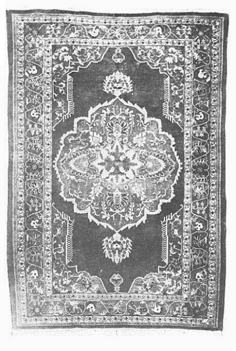 KASHAN SILK RUG.